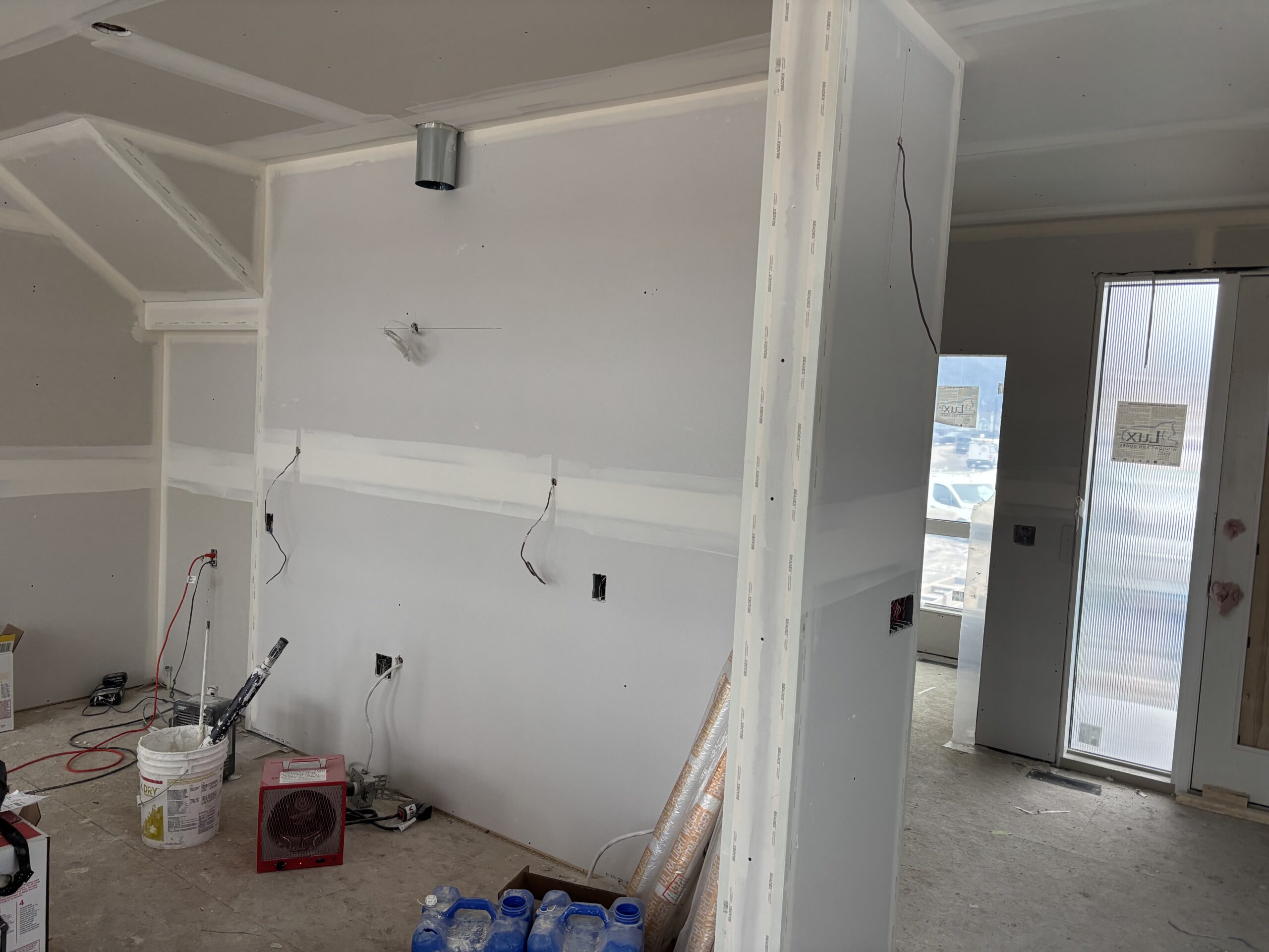 Interior drywall finish and electrical prep