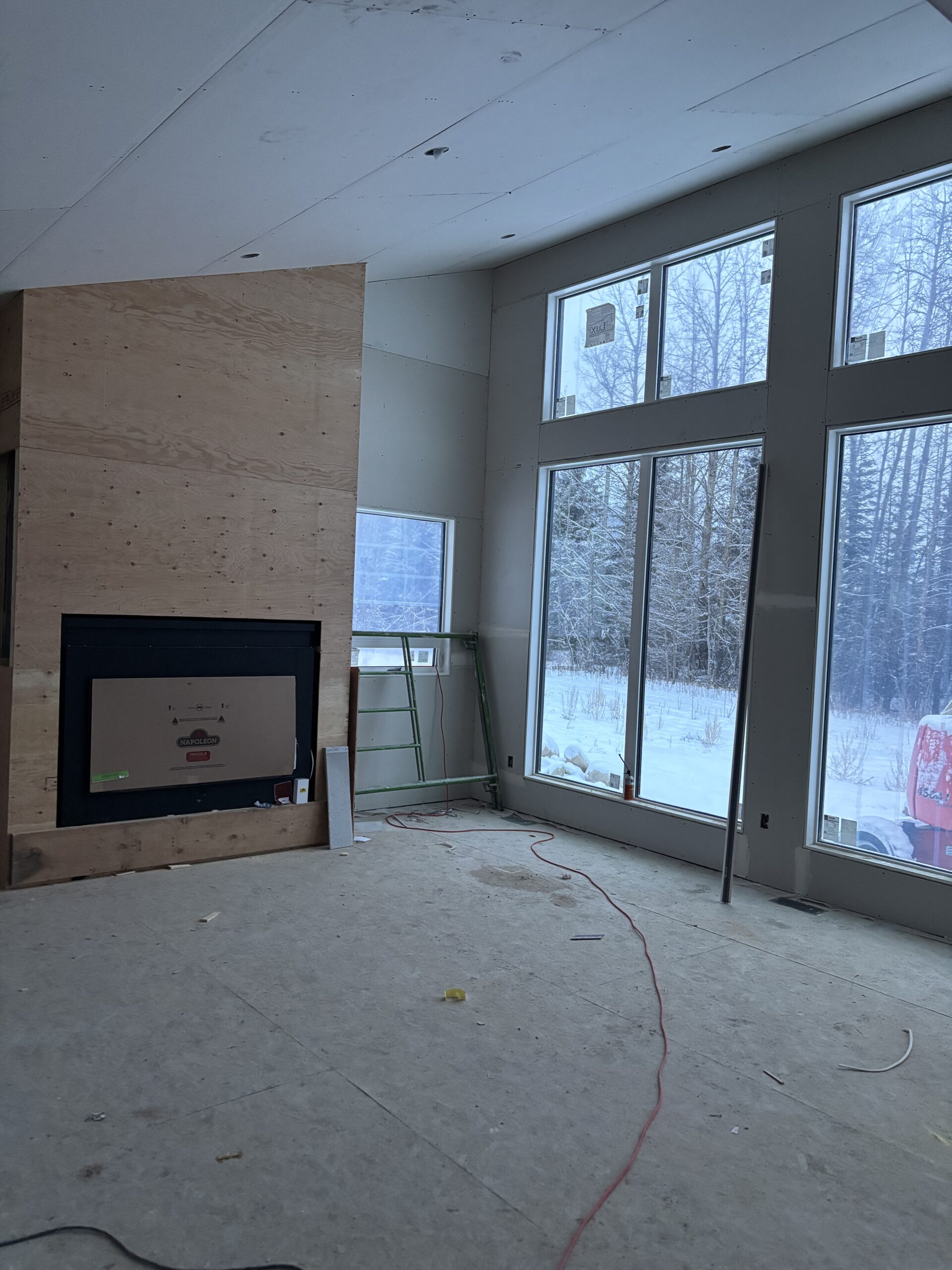 Open concept living space with large glazing